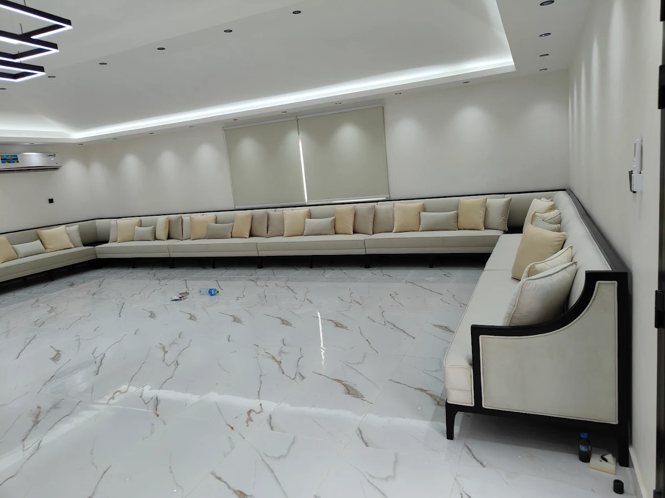 Full majlis lounge seating reupholstered in cream fabric